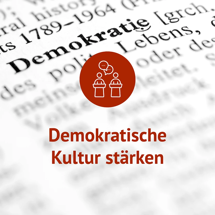 Text mit Dudenauszug im Hintergrund