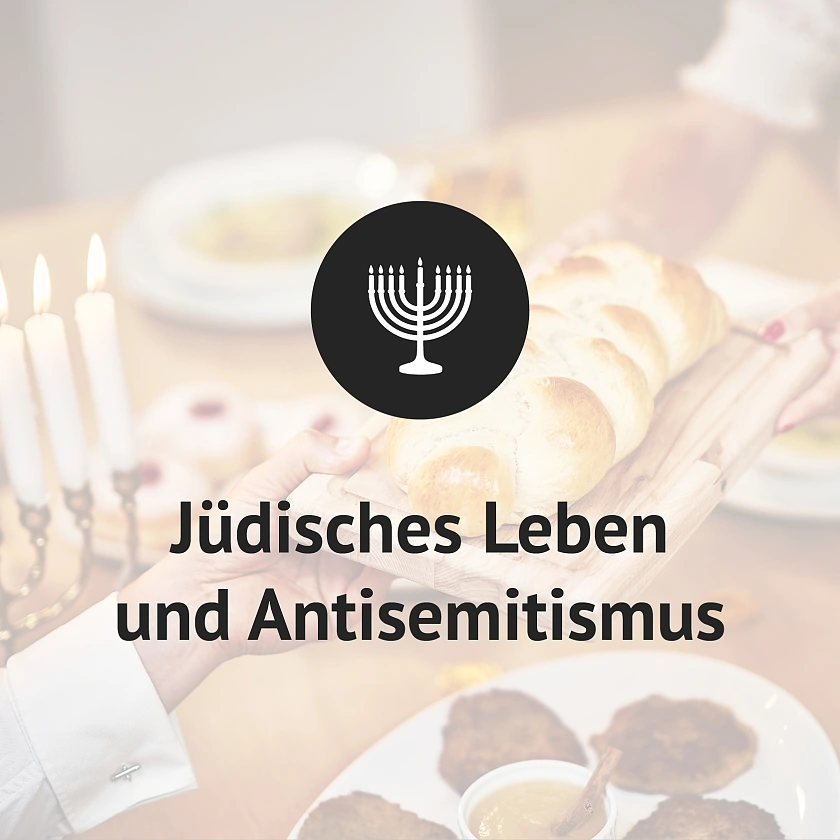 Symbolbild: Jüdisches Abendessen mit der Aufschrift jüdisches Leben und Antisemitismus