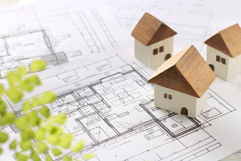 Modellhäuser auf einem Grundriss